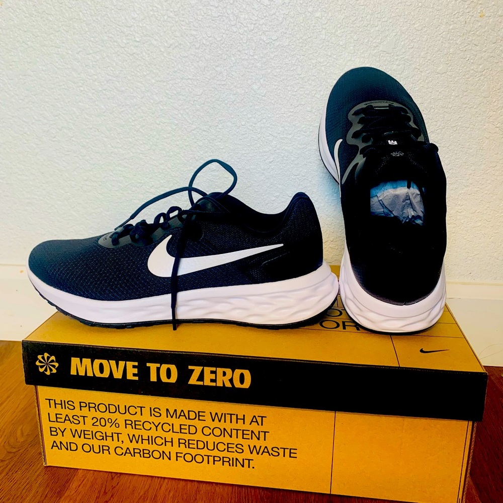 Nike Revolution shoes size 10.5 US black/white its wide  toe